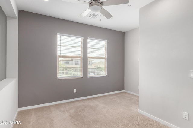 1848 S Follett Way, Gilbert, AZ 85295 - spare room featuring light carpet, baseboards, and ceiling fan