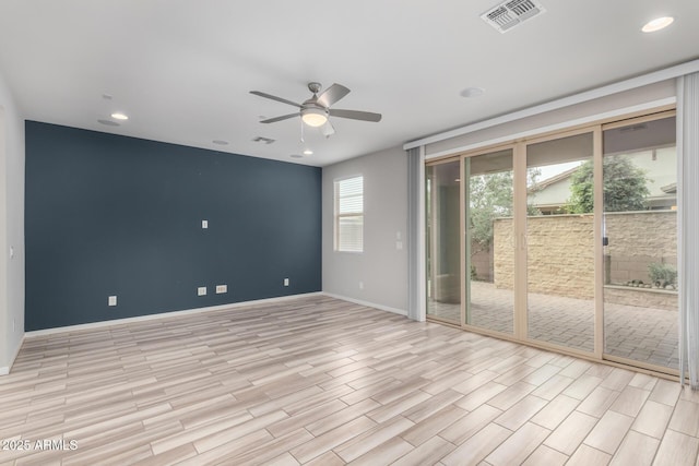 1848 S Follett Way, Gilbert, AZ 85295 - spare room with a ceiling fan, light wood finished floors, baseboards, and recessed lighting