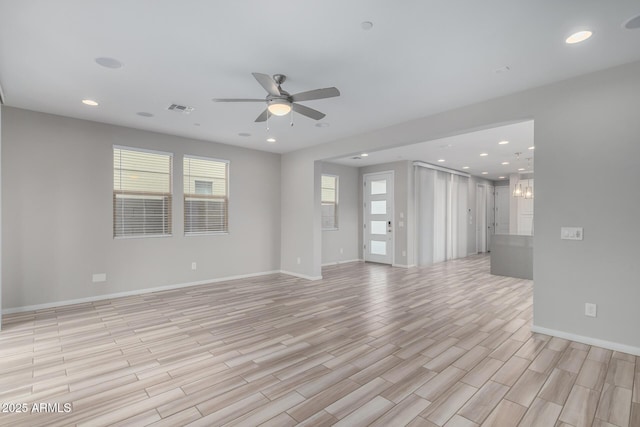 1848 S Follett Way, Gilbert, AZ 85295 - unfurnished living room featuring a ceiling fan, light wood-type flooring, baseboards, and recessed lighting