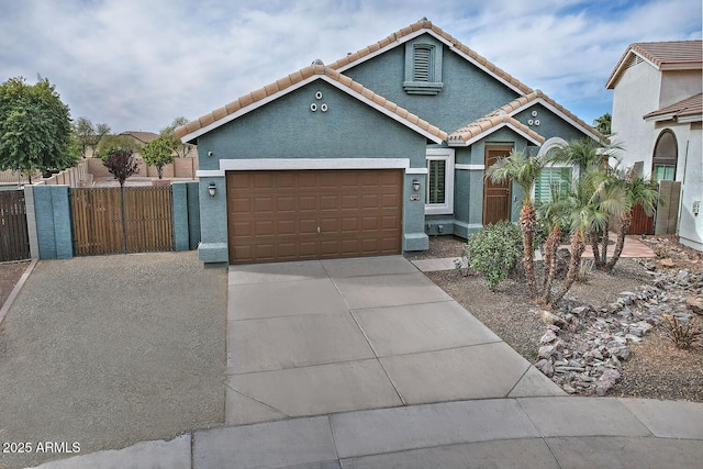 view of front of property with a garage