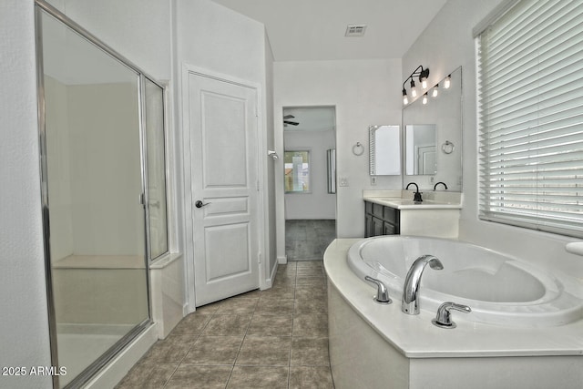 bathroom featuring vanity, tile patterned floors, ceiling fan, and independent shower and bath