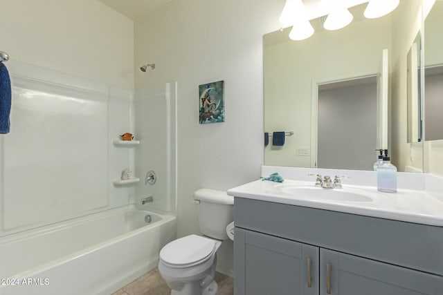 full bathroom with bathtub / shower combination, tile patterned floors, vanity, and toilet