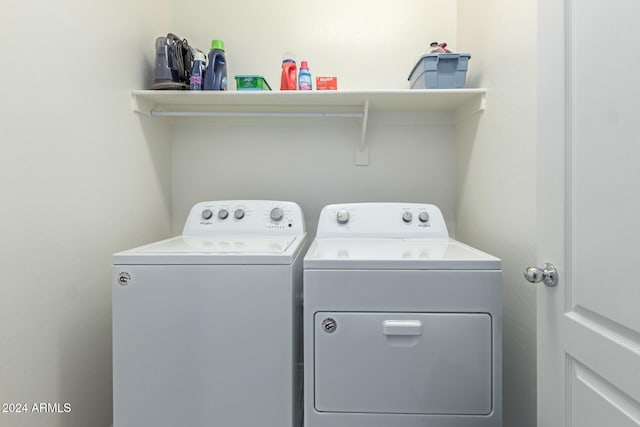 laundry area with washer and clothes dryer