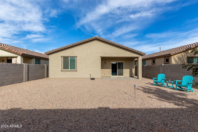 rear view of house with a patio area