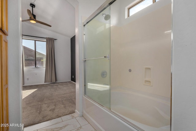 bathroom featuring ceiling fan, lofted ceiling, and shower / bath combination with glass door