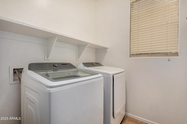 laundry room with washer and clothes dryer