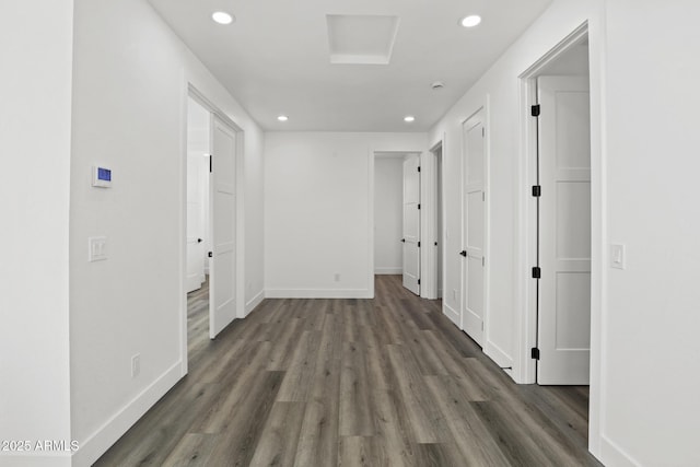 hall with dark hardwood / wood-style flooring