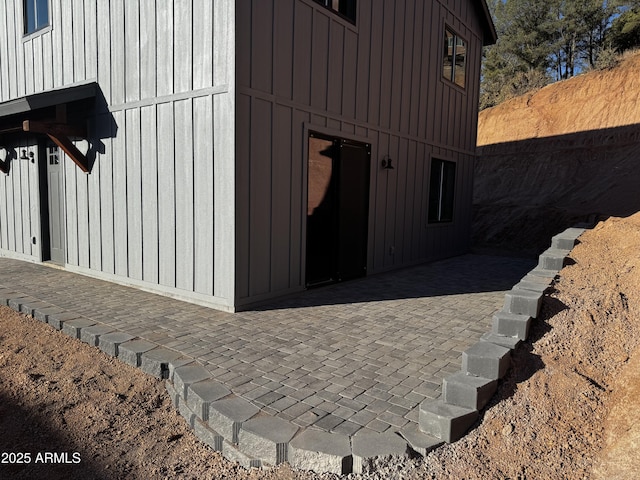 view of property exterior featuring a patio