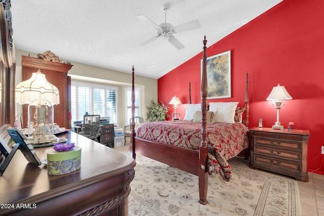 bedroom featuring ceiling fan, lofted ceiling, a textured ceiling, and light tile patterned floors