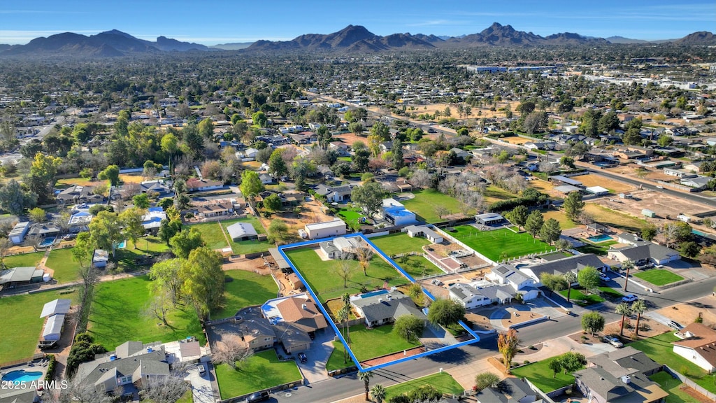 drone / aerial view featuring a mountain view