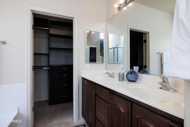 2003 Valley Sage St, Sierra Vista, AZ 85635 - bathroom featuring double vanity and a garden tub