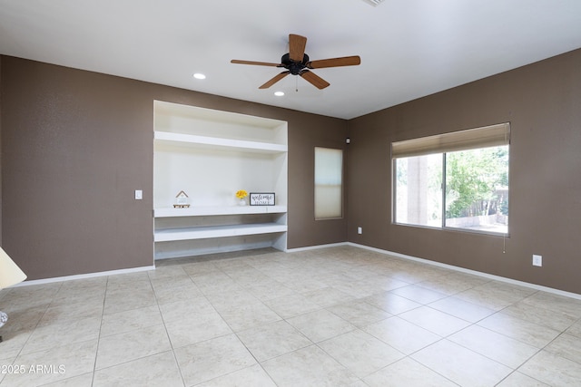 2003 Valley Sage St, Sierra Vista, AZ 85635 - unfurnished living room with a ceiling fan, tile patterned floors, built in features, recessed lighting, and baseboards