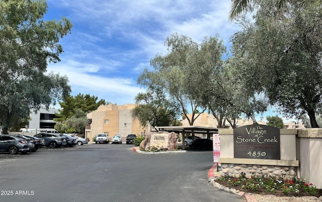 4850 E Desert Cove Ave Unit 241, Scottsdale, AZ 85254 - view of asphalt road featuring curbs