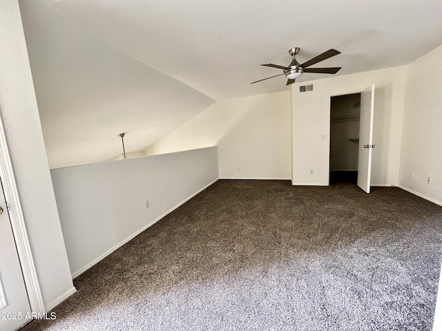 4850 E Desert Cove Ave Unit 241, Scottsdale, AZ 85254 - additional living space with a ceiling fan, carpet flooring, lofted ceiling, and baseboards