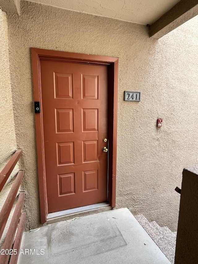4850 E Desert Cove Ave Unit 241, Scottsdale, AZ 85254 - view of exterior entry with stucco siding