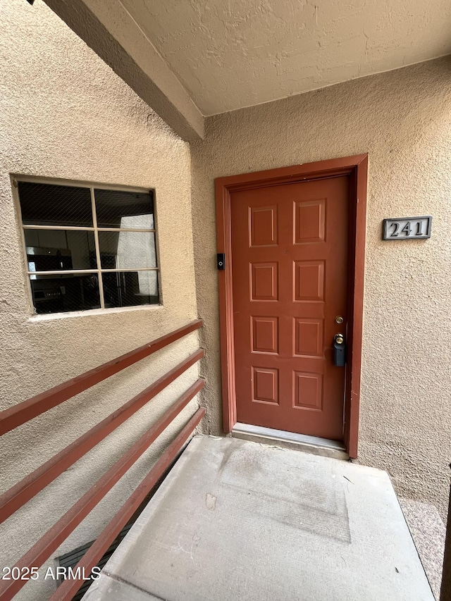 4850 E Desert Cove Ave Unit 241, Scottsdale, AZ 85254 - property entrance with stucco siding