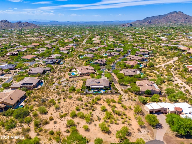 birds eye view of property featuring a mountain view