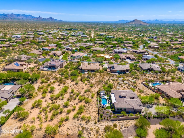 bird's eye view with a mountain view