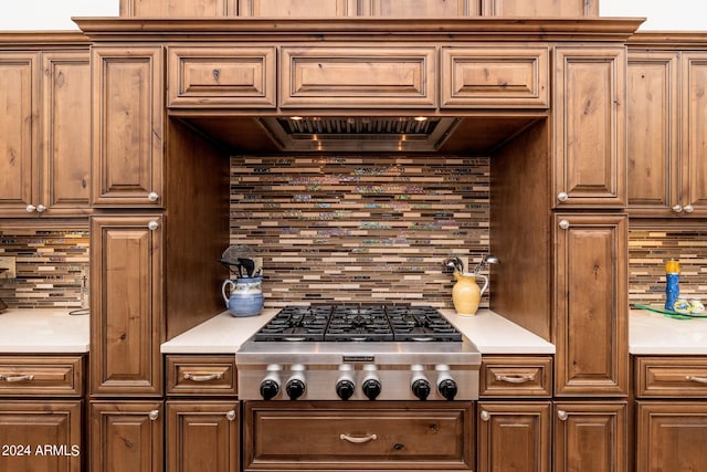 kitchen featuring stainless steel gas cooktop and tasteful backsplash