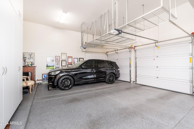 garage featuring a garage door opener