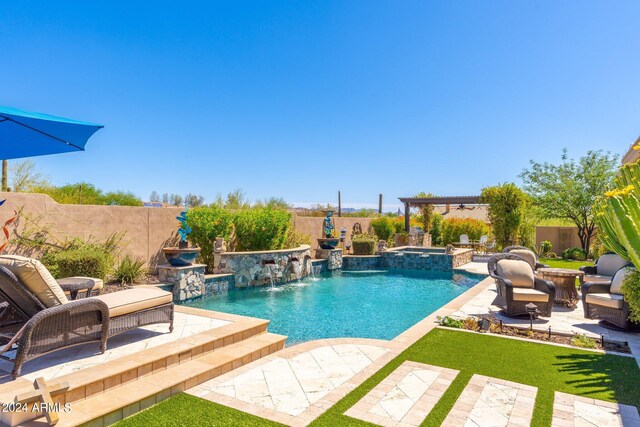 view of swimming pool featuring a patio and pool water feature