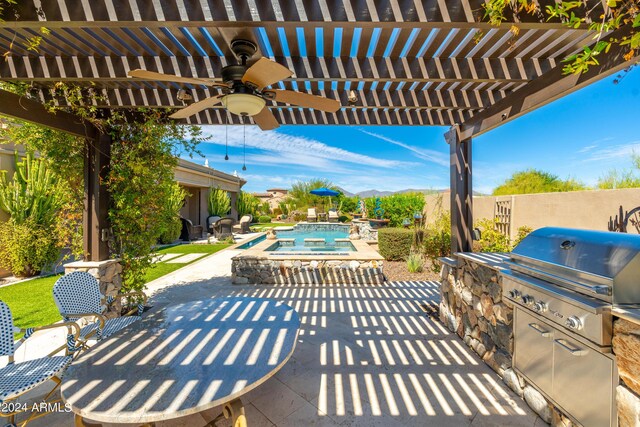 view of patio / terrace featuring a pergola, ceiling fan, a grill, and a swimming pool with hot tub