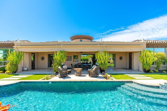 rear view of house with a patio area