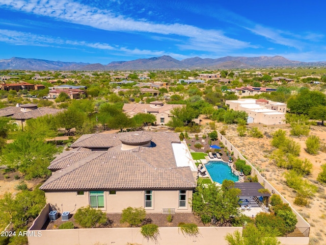 drone / aerial view featuring a mountain view