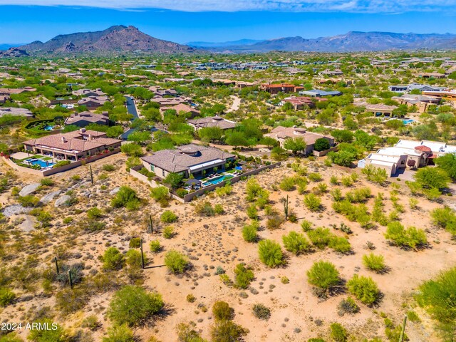 drone / aerial view featuring a mountain view