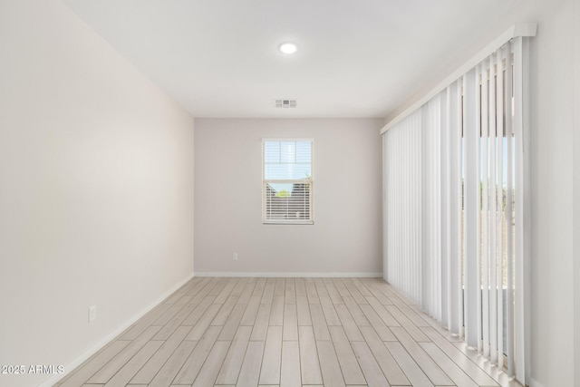 22507 E Quintero Rd, Queen Creek, AZ 85142 - empty room with baseboards and light wood-style floors
