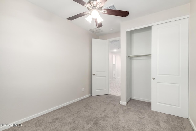 22507 E Quintero Rd, Queen Creek, AZ 85142 - unfurnished bedroom with carpet, a closet, and ceiling fan