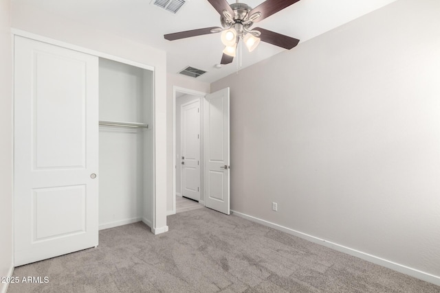22507 E Quintero Rd, Queen Creek, AZ 85142 - unfurnished bedroom featuring carpet, a closet, and a ceiling fan