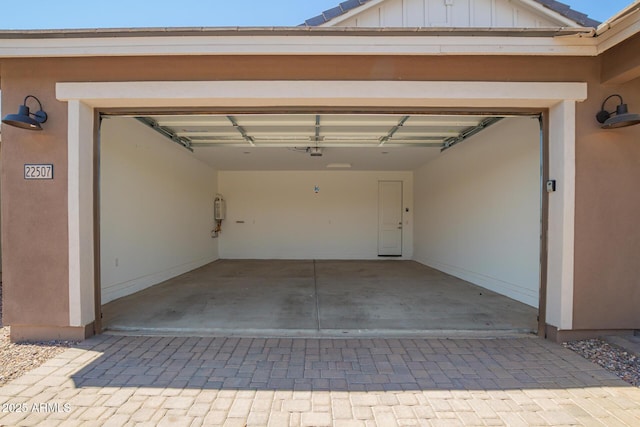 22507 E Quintero Rd, Queen Creek, AZ 85142 - garage with decorative driveway and a garage door opener