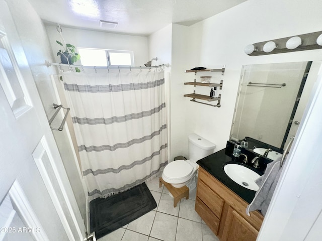 full bathroom featuring toilet, tile patterned floors, vanity, and a shower with shower curtain