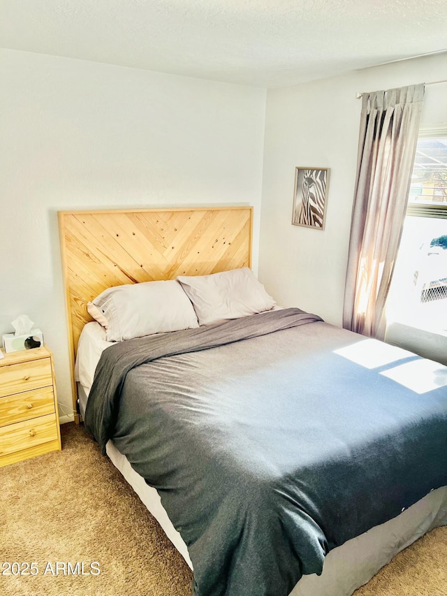 bedroom featuring carpet