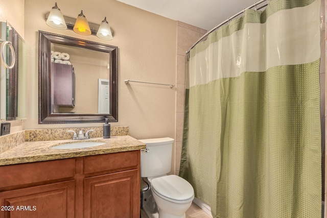 50031 N 27th Ave, New River, AZ 85087 - full bath featuring toilet, vanity, tile patterned flooring, and curtained shower