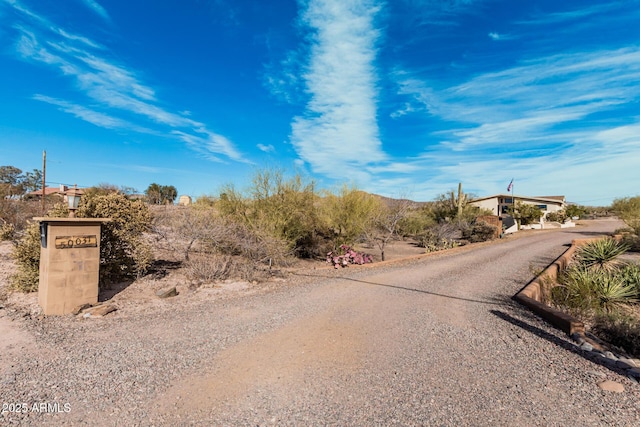 view of road featuring driveway