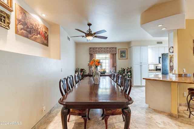 dining room with ceiling fan