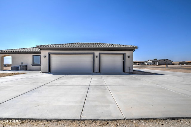 garage with central AC unit