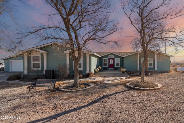 ranch-style home with a garage