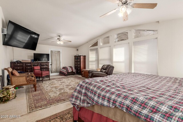 bedroom with ceiling fan, carpet, and vaulted ceiling