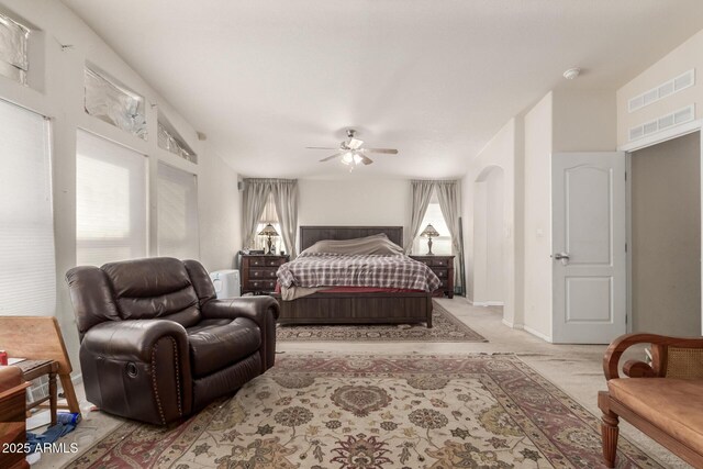 bedroom with ceiling fan and light colored carpet