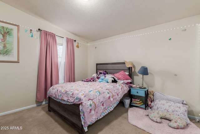 bedroom with light colored carpet