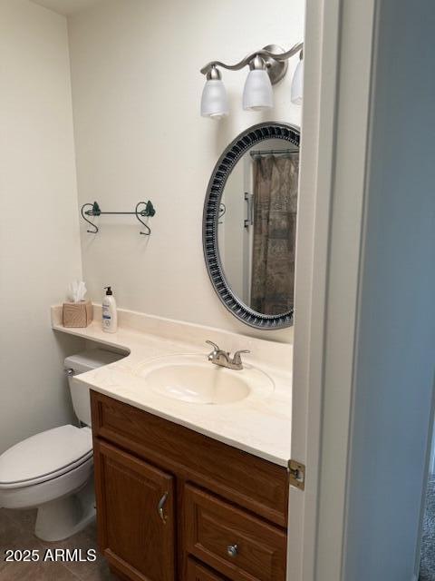 13822 N Silverbell Dr Unit 15C, Sun City, AZ 85351 - bathroom with vanity and toilet