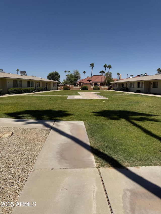 13822 N Silverbell Dr Unit 15C, Sun City, AZ 85351 - view of grassy yard with a residential view