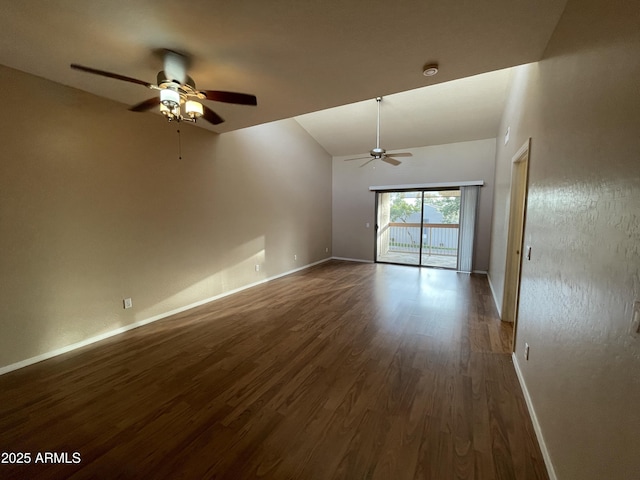 spare room featuring dark hardwood / wood-style floors and ceiling fan