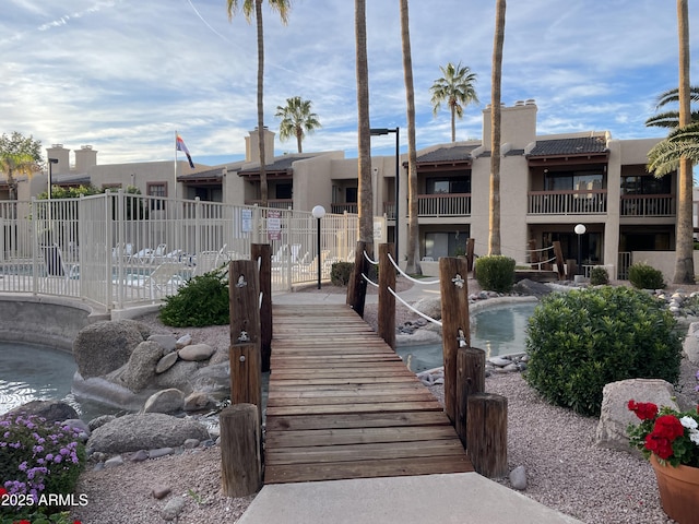 view of property's community with a pool