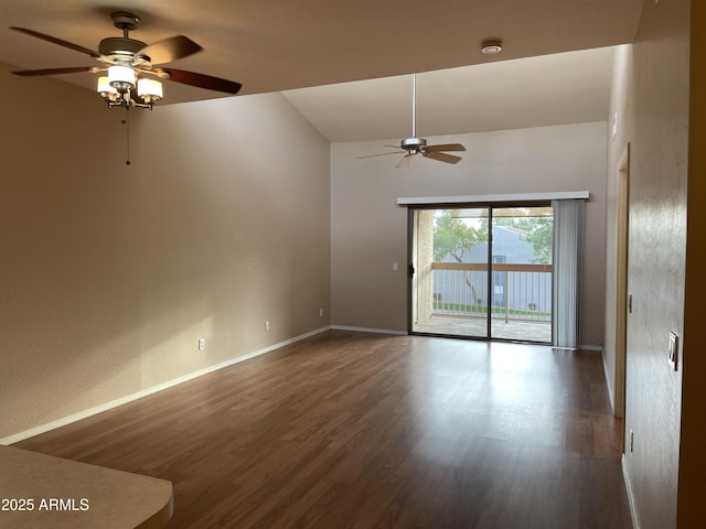 unfurnished room featuring dark wood-type flooring and ceiling fan