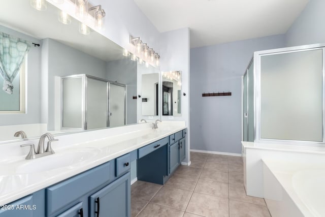 9142 W Pontiac Dr, Peoria, AZ 85382 - full bath featuring a stall shower, double vanity, a garden tub, and tile patterned floors