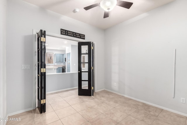 9142 W Pontiac Dr, Peoria, AZ 85382 - spare room with a smoke detector, ceiling fan, and light tile patterned flooring